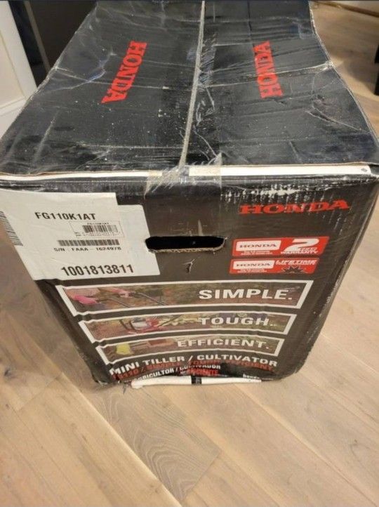 Honda 9 in. 25 cc 4 Cycle Middle Tine Forward Rotating Gas Mini Tiller Cultivator