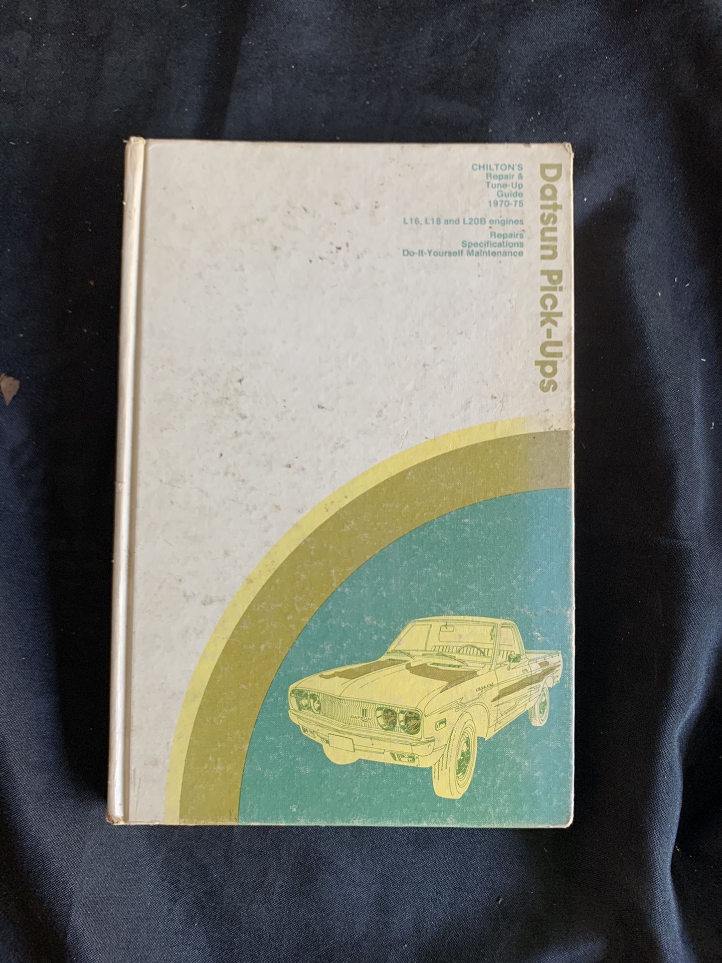 70s Datsun truck repair book