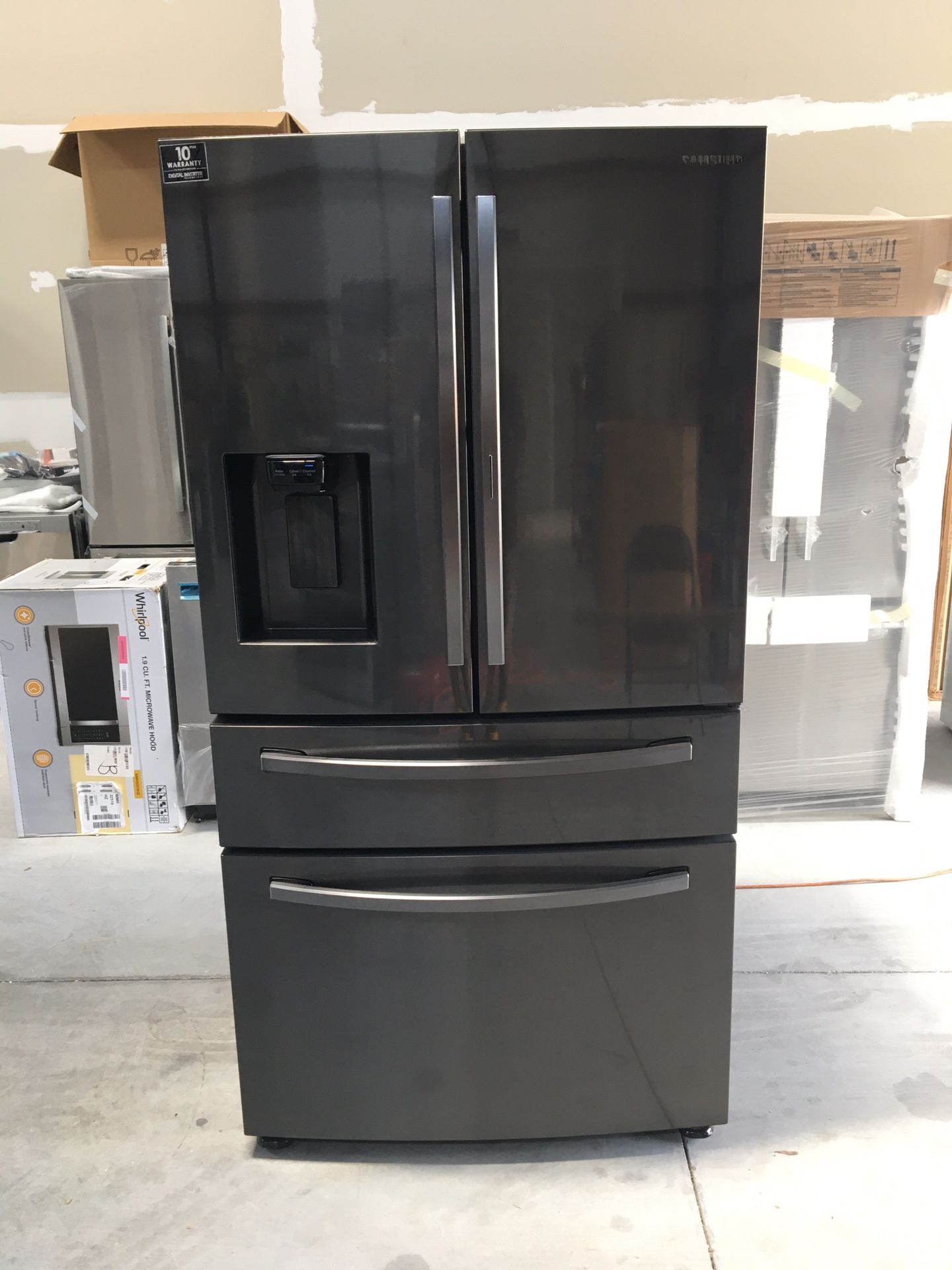 Brand new open box Samsung Black Stainless for door refrigerator with showcase door and inside water pitcher