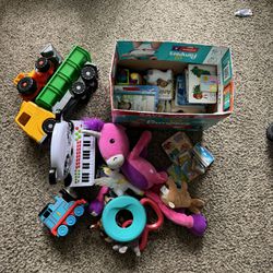 sell piano truck and train and soft toys