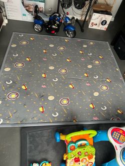 80”x73” space themed play-mat.