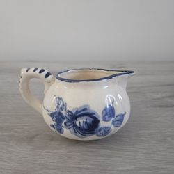 Earthenware creamer made in Japan.