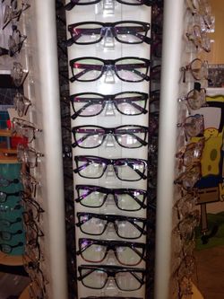 Glasses (frame and prescription lenses)
