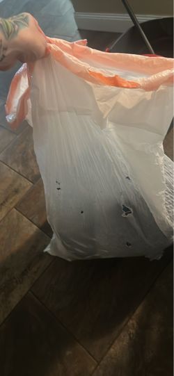 Full bag of woman’s clothes