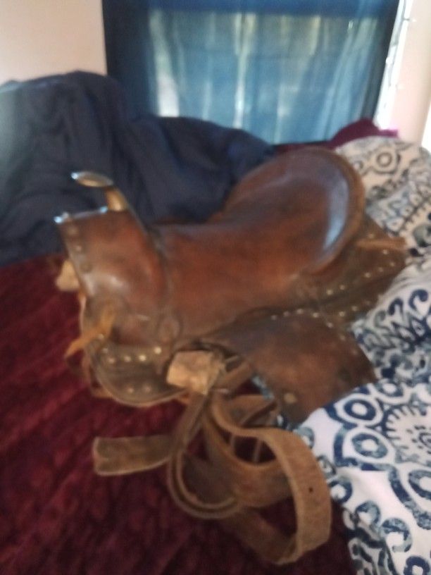 Three Horse Saddles Plus and Fence To Attach Horse To