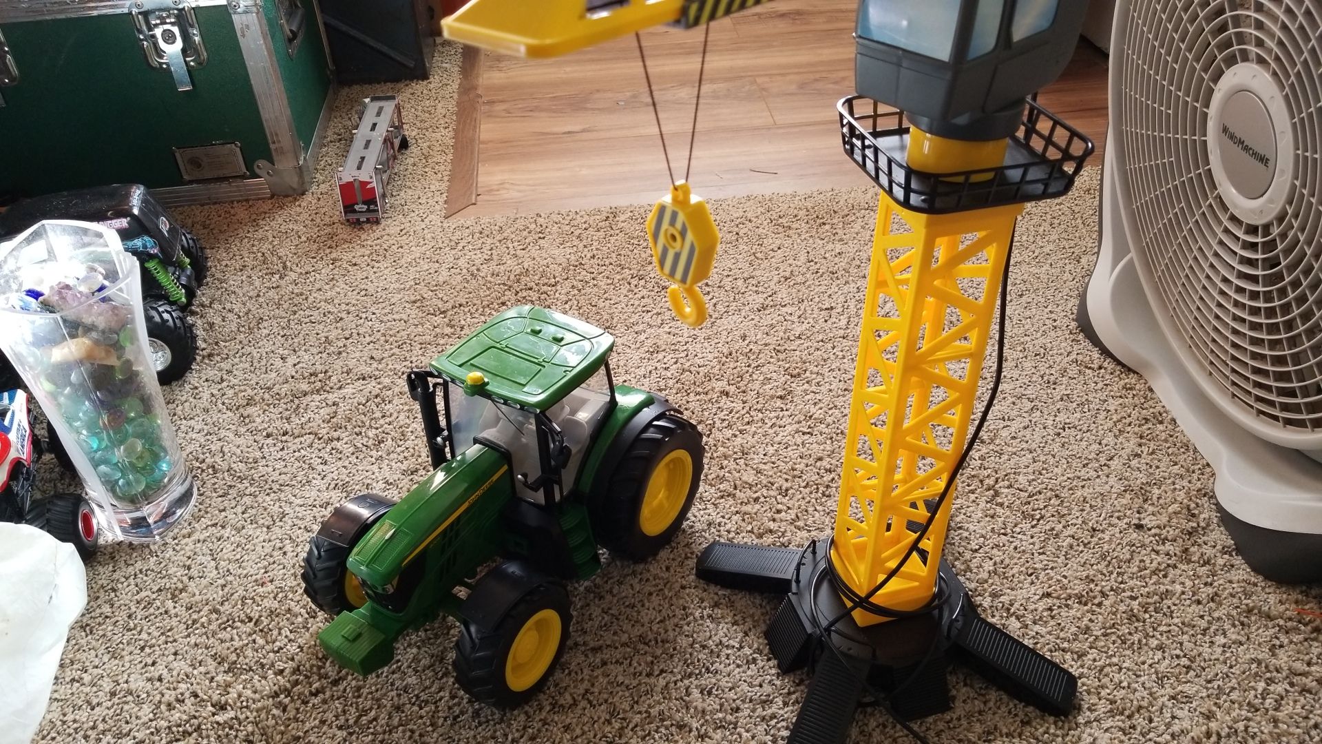 Crane and tractor. Both work