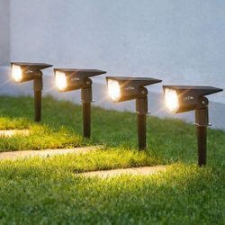 New In Box Set Of 4 Solar Powered LED Landscaping Landscape Spotlight Pathway Light
