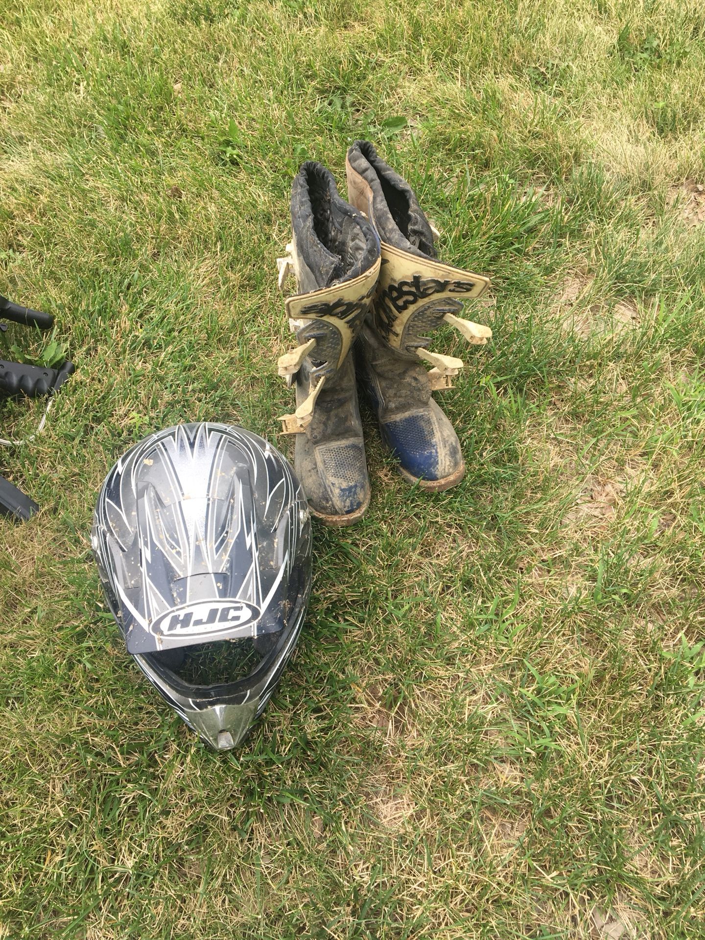 $70 Dirt bike helmet (size medium HJC) & boots (size 8 men’s)
