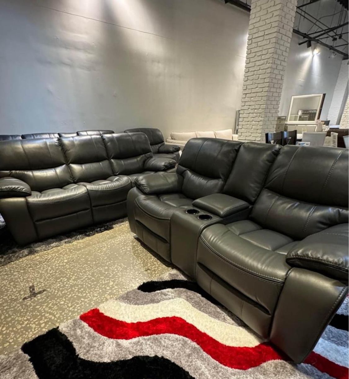 Going out of business sale. Madrid, gray leather reclining sofa and loveseat set now $1099. Easy finance option. Same day delivery.