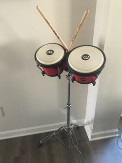 Congas. Like new W/stand. $150. Firm price.