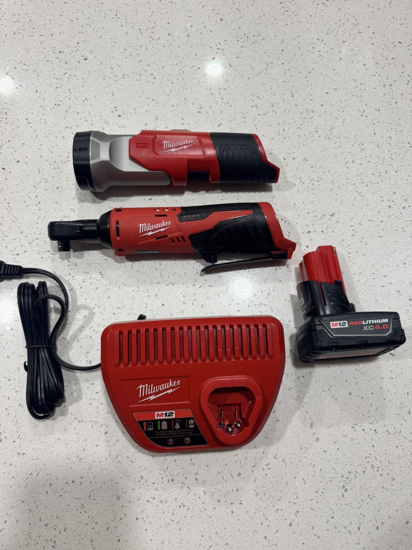 Milwaukee M12 3/8” Ratchet, 4.0AH Battery, Flashlight And Charger All NEW