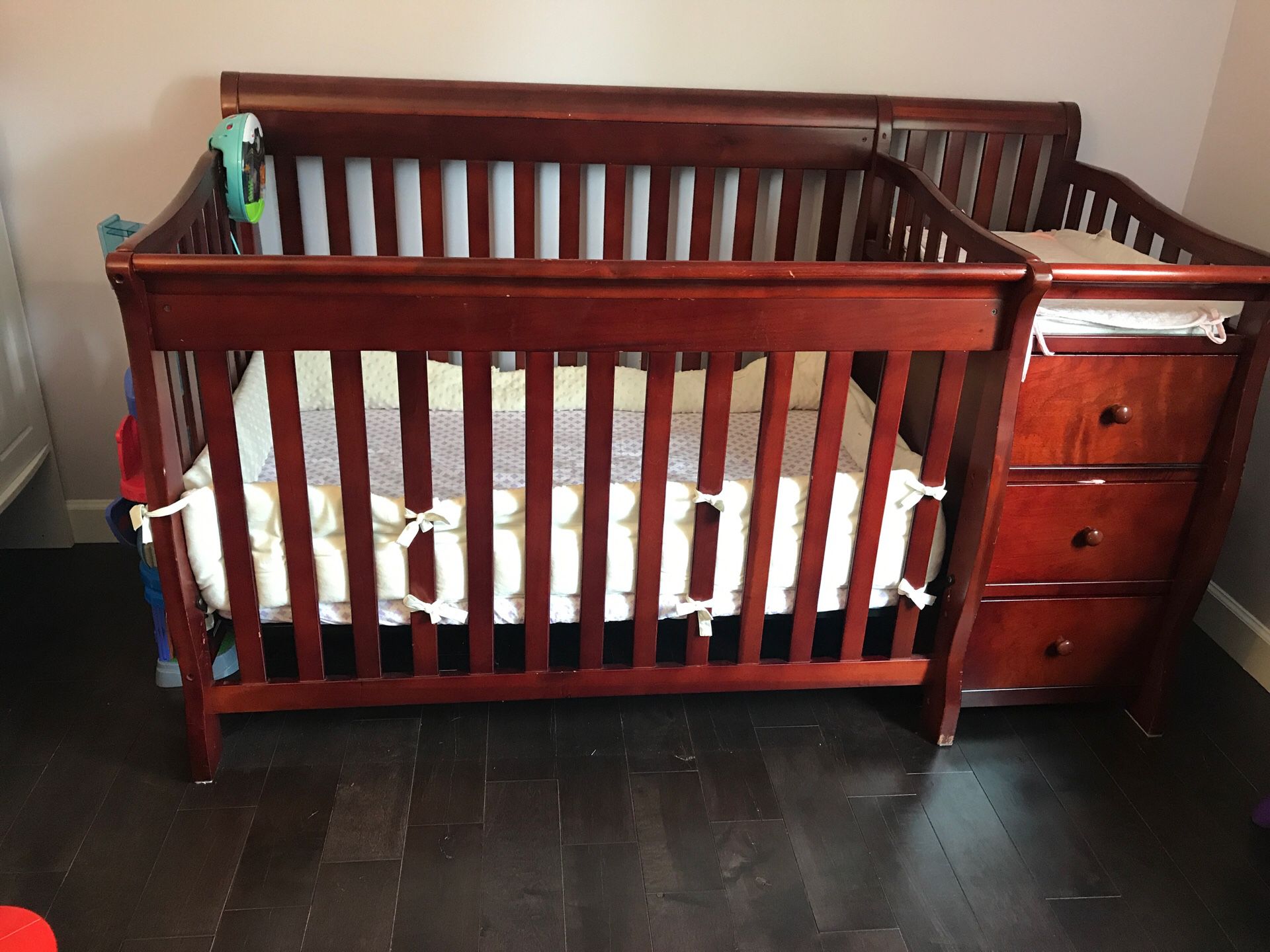 Convertible crib with changing table