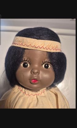 Vintage 1940s or 1950s hard plastic indian doll