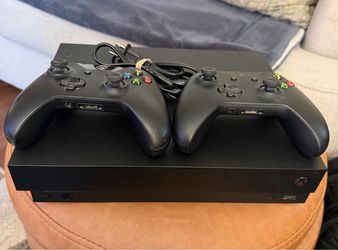Xbox One X Console with Two Controllers