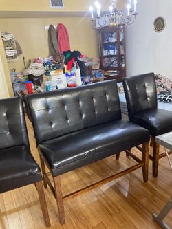 Leather bench with two matching chairs for $60