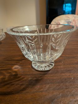 Waterford Crystal footed bowl, likely in the "Glencar" pattern, featuring distinct vertical cuts.The bowl is 6 inches in diameter and sits on a small 