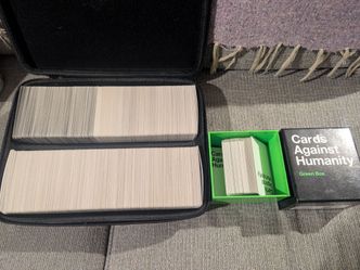 Cards against humanity set and carrying case