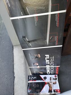 Cast iron adjustable dumbbells with workout bench