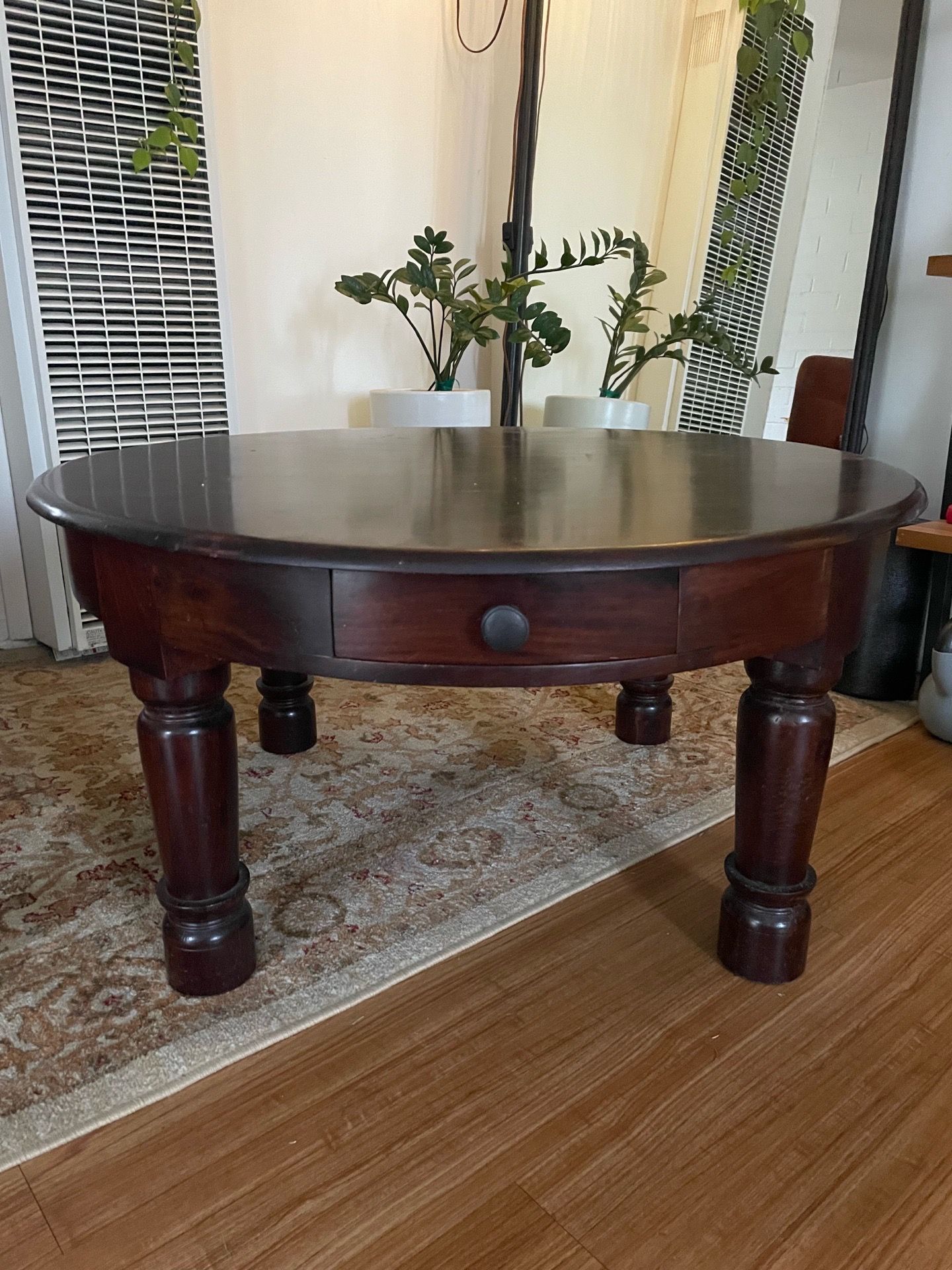 Dark wood, round coffee table