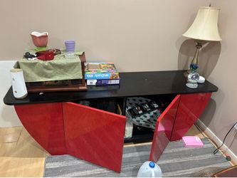 Red/black entertainment center with speakers