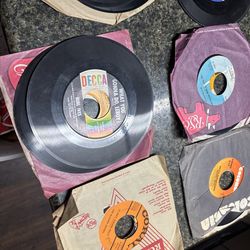 Vintage 45 records and TWA play cards