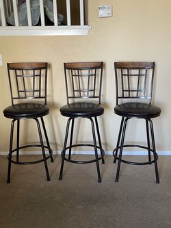 Set of 3 Swivel Metal Bar Stools with Wood Accents