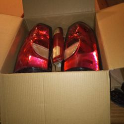 Chevrolet Silverado 2006 Rear Tail Lights And Third Break Light Life Left With Fair Damage 