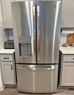 GE Stainless Steel French Door Refrigerator with Water Dispenser