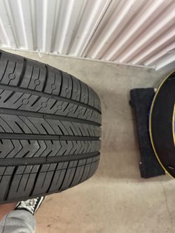 Model 3 stock wheels with Michelin pilot sport 4 all season tires.