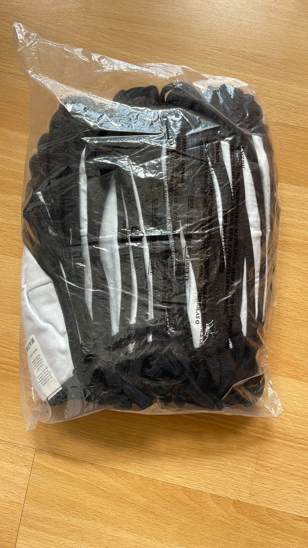 A Pack Of Black Face Masks 95% Cotton 5% Spandex
