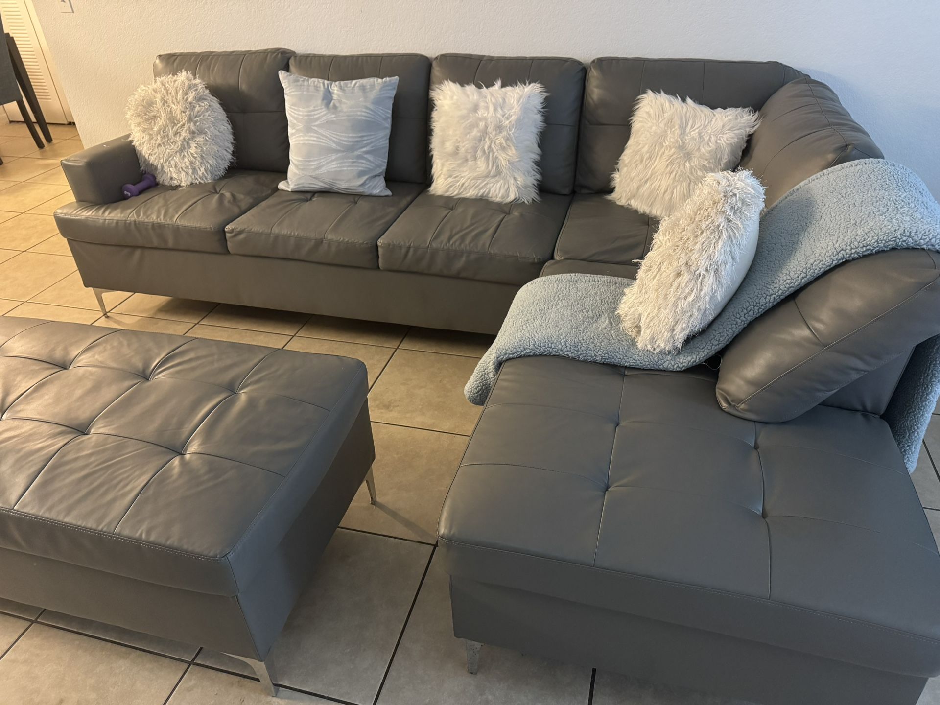 Moving Sale, It is a leather Sofa