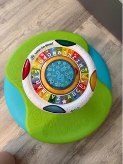 Leapfrog spinning toy