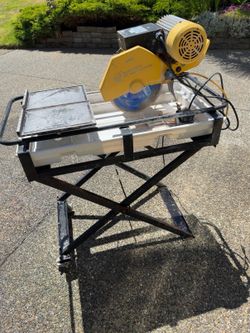 QEP Model 60010 Professional Tile Saw, a 2 HP wet tile saw with a 10-inch diamond blade.