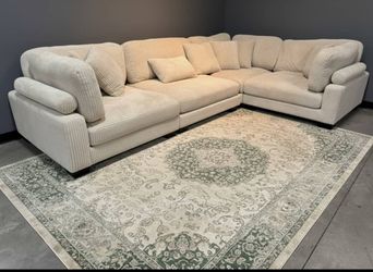 I'm selling a new modular sectional sofa. 