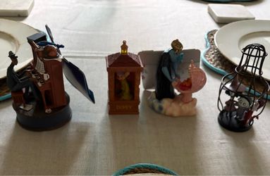 4 Disney ornaments.
