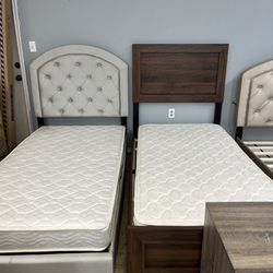 Twin Bed frames With Displayed Mattress