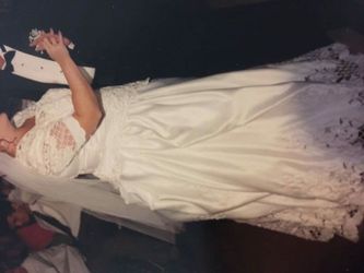 Wedding dress size 20-23 1500 or best offer sealed in a wedding box no holds