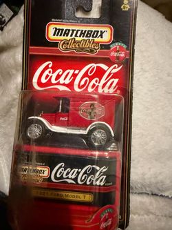 2 Coca Cola matchbox cars