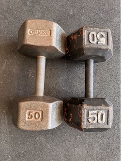 Mixed pair of 50 pound dumbbells (vintage ivanko)