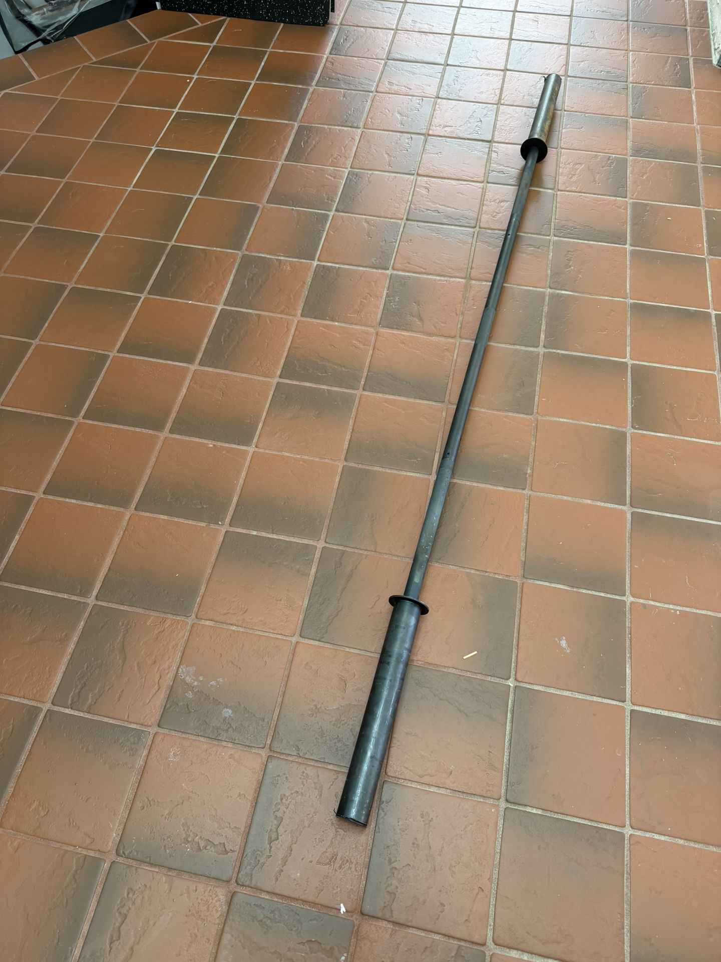 Olympic Bar. 2”. 7 Feet Long. It’s A Three-Piece Bar. Solid Bar.