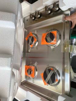 GE Stainless Steel 4-Burner Gas Cooktop New never opened or used