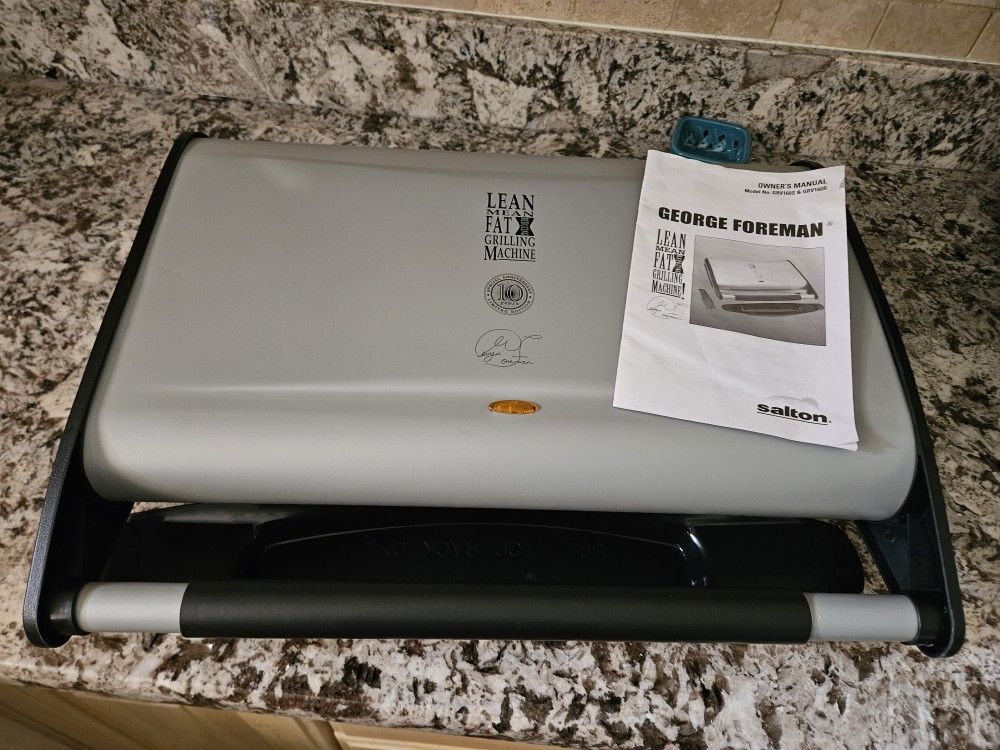 New George Foreman Grill, Books & 2 Drip Trays. No Box
