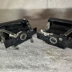 Pair of antique Houghton Ensignette No.1 strut-folding cameras