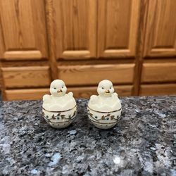 Lenox Handcrafted Easter Theme Chicks in Egg Pair of Salt & Pepper Shakers.  Size approximately 2 1/4 inches tall.  Brand new never used.  Has been on