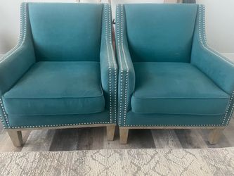 2 Teal accent chairs
