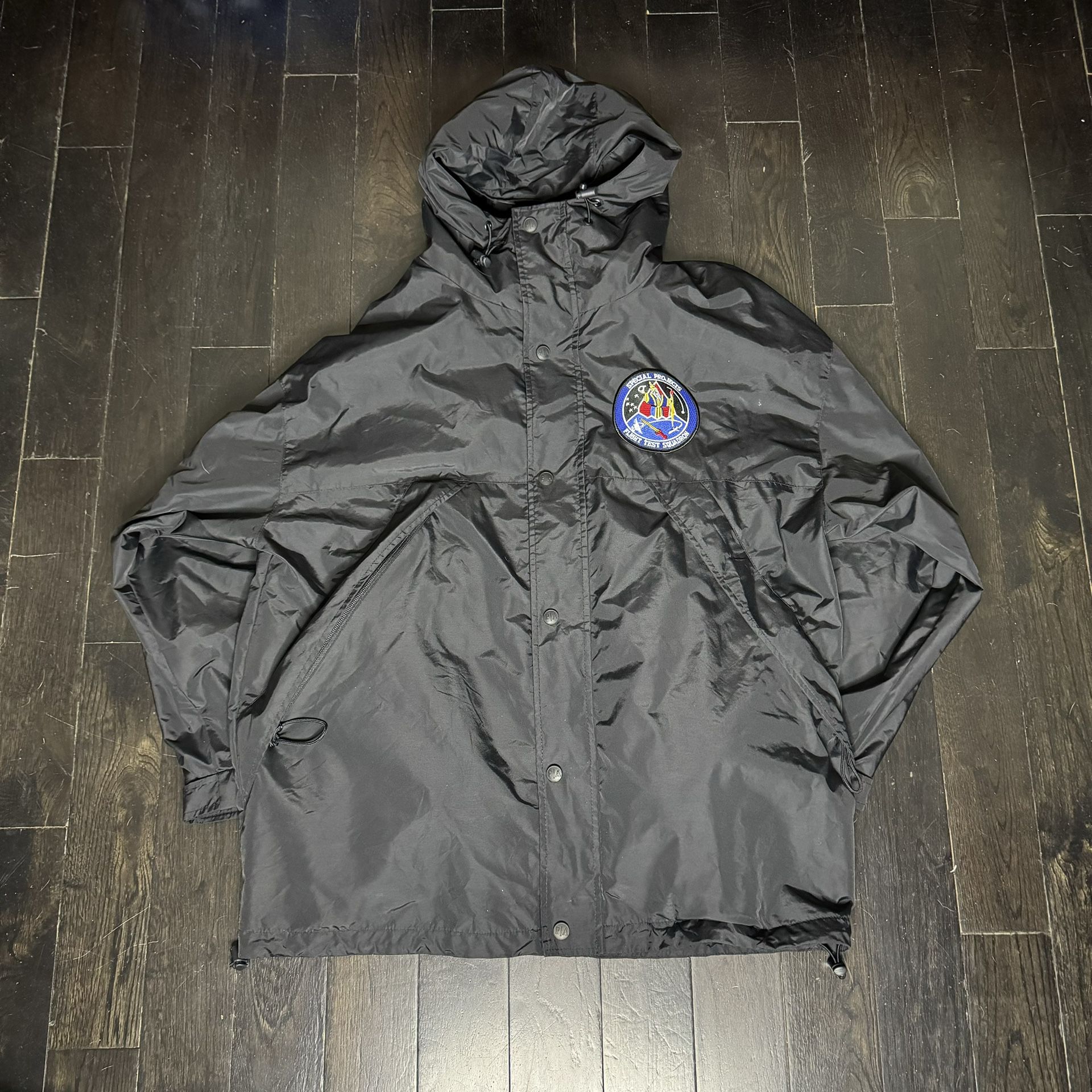 Vintage Y2K Port Authority Special Projects Flight Test Squadron Black Layered Coat Sz Large  Measurements  W: 26” L: 31”  Jacket has detachable sweat
