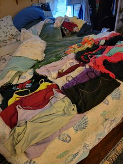 Selling as a bundle summer tank tops over 40 of them sizes small to medium