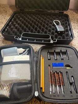 Brand new handgun case, lock & cleaning kit