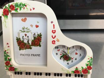 Photo frame with clock