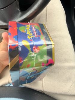 Charizard Tin Sealed